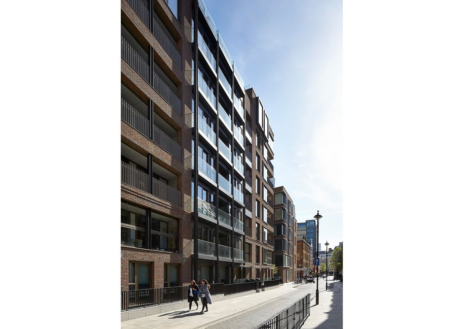 Facing north along Riding House St with education room at lower ground for the school opposite.