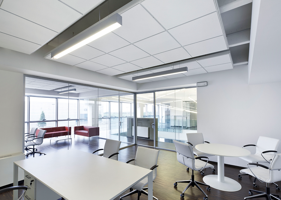 The offices of tomorrow will be user-centric environments: Zentia Axiom C Canopy and Ultima+ MicroLook ceiling tiles at the headquarters of transmission components manufacturer Piazzalunga in Bergamo.