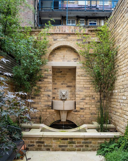 Lutyens inspired fountain at rear of garden.