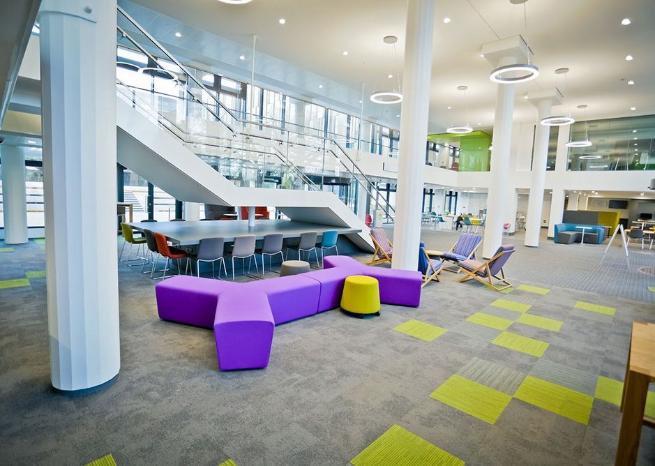 Interface multi-tonal modular flooring in the open space of the Gateway at Oxford Brookes University.