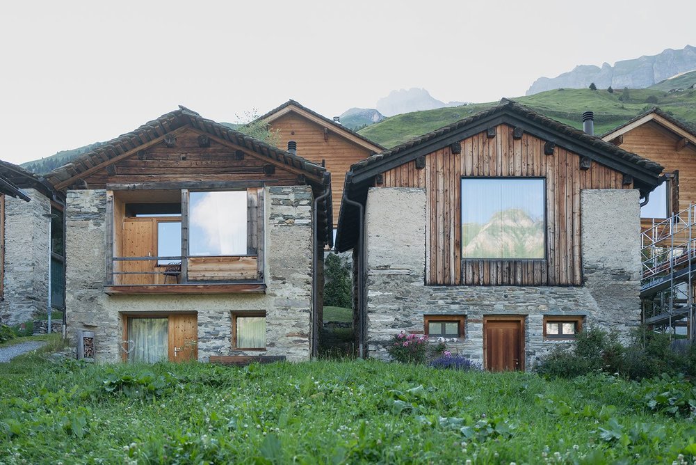 Repurposing traditional mountain huts with stone base/timber top as contemporary homes.