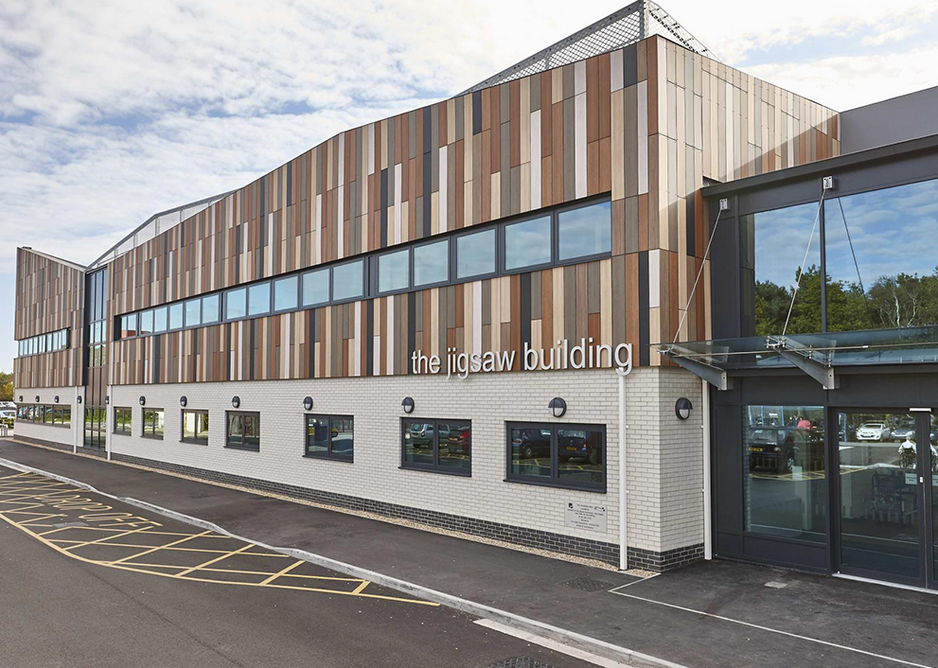 Trespa Meteon cladding in eight shades at The Jigswaw Building chemotherapy day unit, Bournemouth Hospital.