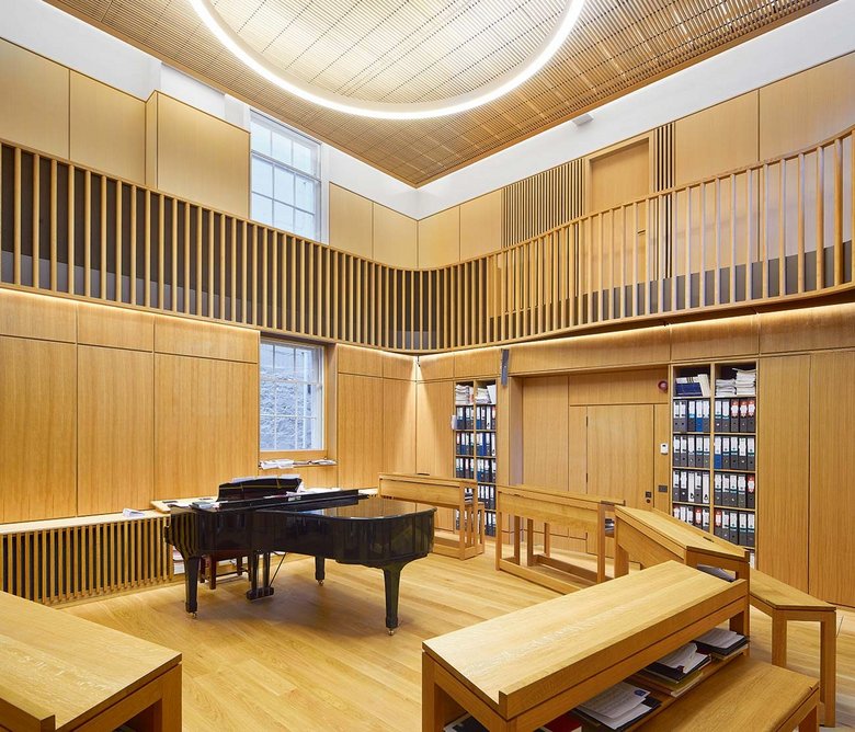 Timber-lined, acoustically tuned choir practice room.