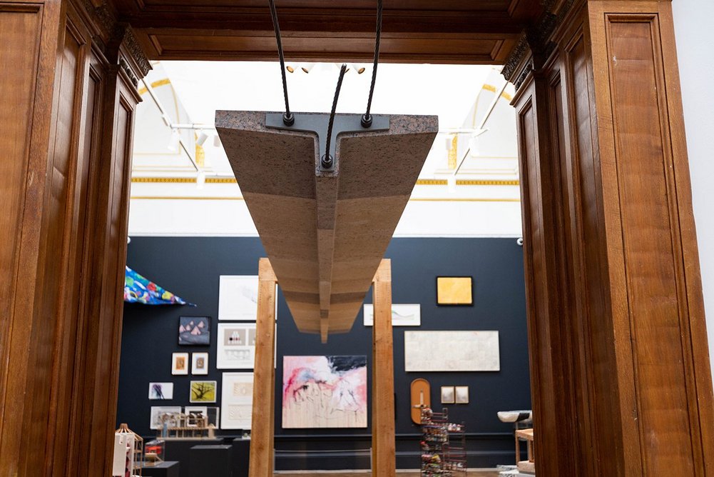 A huge beam of recycled stone exhibited by Webb Yates leads visitors into the first architecture/art gallery.