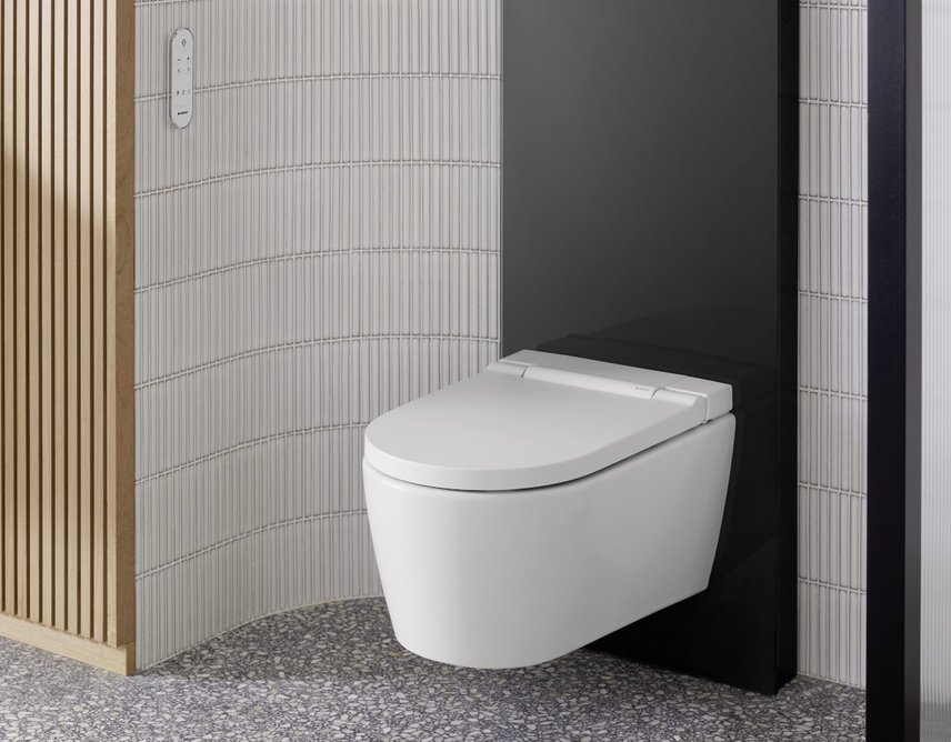 Geberit ONE wall-hung WC in White Satin finish with Geberit Monolith Plus in black glass.