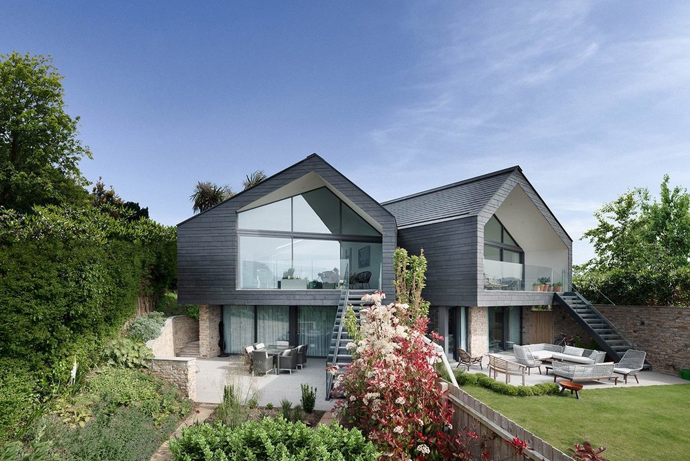 Conscious uncoupling: at the back, the properties angle away from each other, the slope facilitating lower levels for bedrooms and bathrooms.