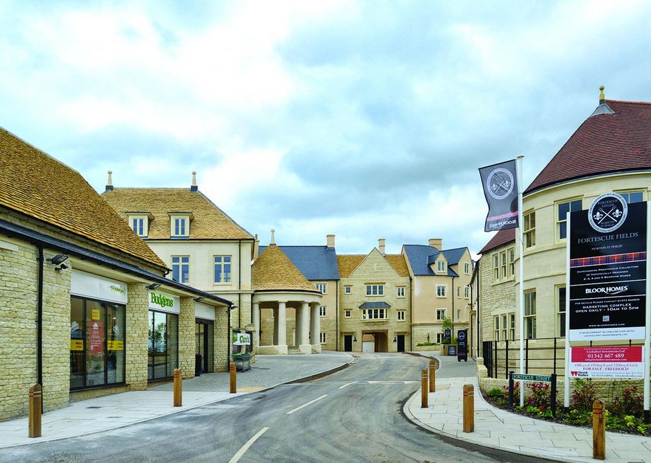 Modernists need not apply:  the sequence of historicist entrance buildings, including a shop and  post office.