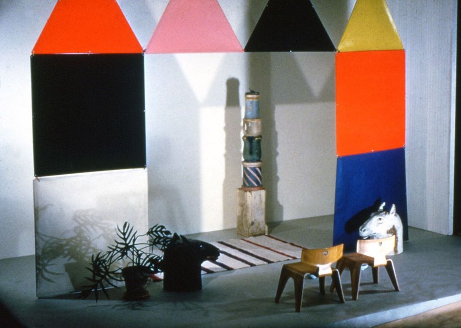 Tableau of The Toy and plywood children's furniture set up in the