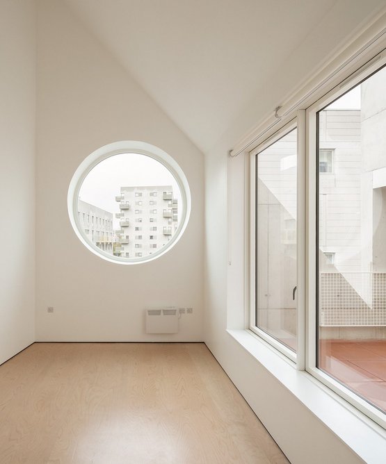 Four non-standard flats incorporate features including rooflights and a double-height space.