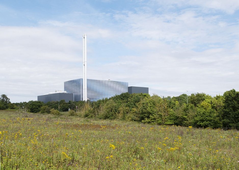 Slender 81m flues with translucent boilerhouse behind.