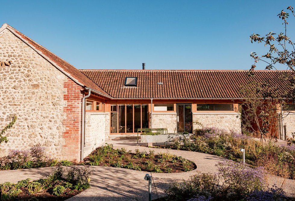 The barns have been refurbished and adapted into five accessible self-catered holiday cottages with a shared courtyard garden between them.