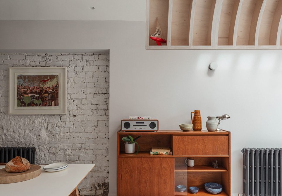 Exposed brickwork indicates the footprint of the previous kitchen.