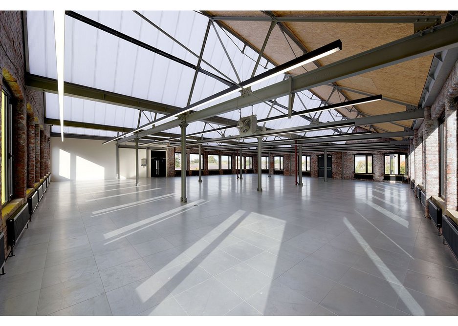 Inside Stubbs Mills Sixtwo has substituted glazing for polycarbonate roofing and left SIPPS panels exposed.