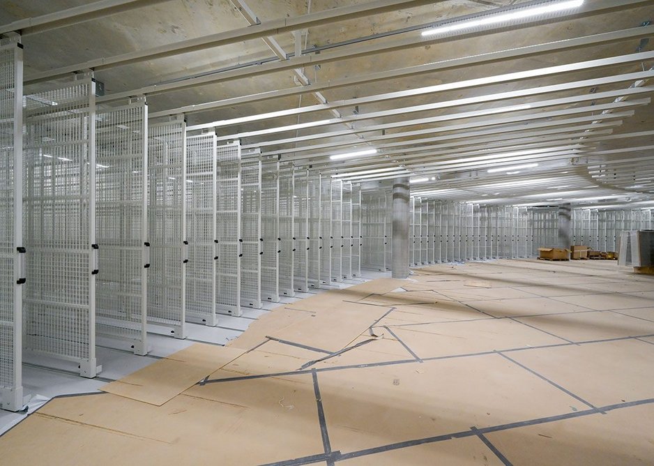 The building's main purpose is to provide safe and secure storage for the museum's artworks in a compact way.