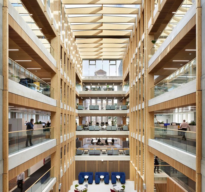 A dramatic atrium overlooked by open walkways forms the heart of the new building.