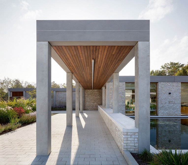 The covered floral tribute area, beside the chapel of remembrance, allows for contemplation before exiting back out to the car park.