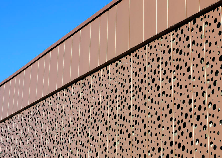 Perforated Pigmento Red Interlocking rainscreen panels, Grenoble.