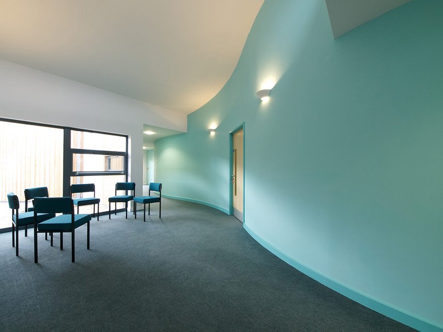 Mark Ellerby Architects, Nightingale Centre, Mark Rutherford School, Bedford, 2013. The centre aims to create an oasis of calm through a series of staggered ‘classroom’ blocks with a snaking corridor. Its curved wall – easier for brains to compute, avoiding hidden corners – has proved a favourite with students.