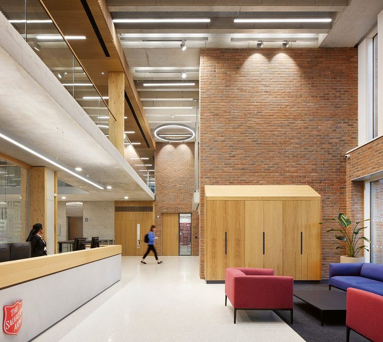 Reception – the brick walls are a reference to the external expression.
