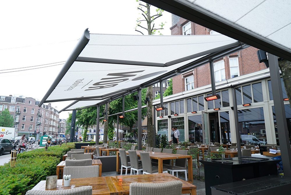 Markilux folding arm awnings can be specified with built-in heating.