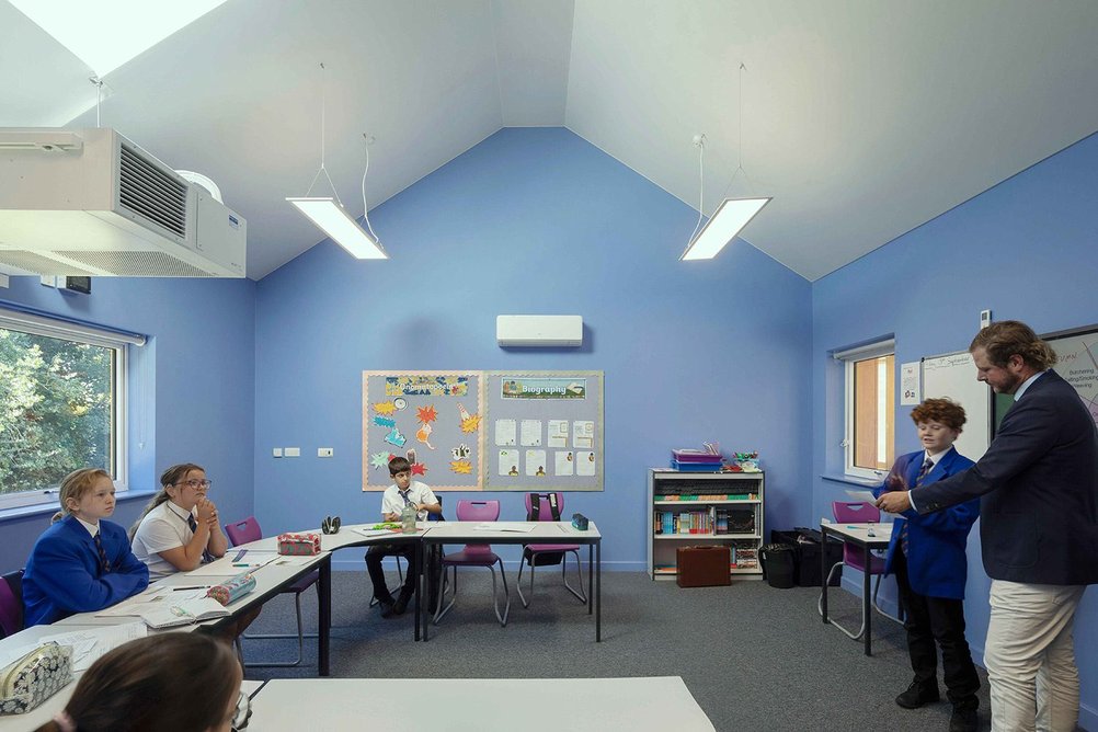 Heathlands School Classroom Building, St Albans, by Manalo & White: Carefully chosen colours, multiple windows and acoustic panels aid communication.