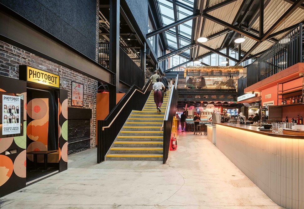 Inside the Cambridge Street Collective food hall, where FCBS has created a vast multi-storey space beneath a new roof.