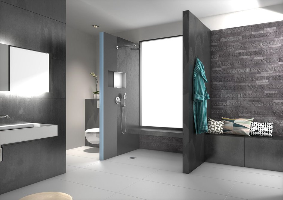 Wedi Sanwell shower wall module: a custom-specific product with integrated Hansgrohe i-Box, hot and cold water pipes, reinforcements for the shower outlets and a niche for storage. Shown with a tiled Sanoasa floating bench and Fundo shower element with point drainage.