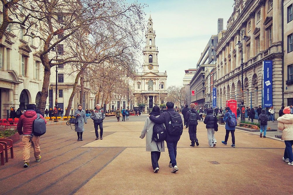 Markings in the surface of the new public space relate to the footprints of adjacent buildings.