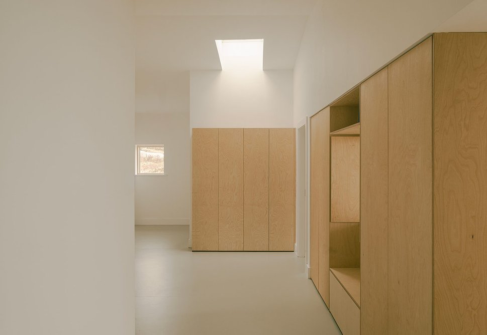 A 1960s-style hatch provices a visual and physical link between the hallway and kitchen.