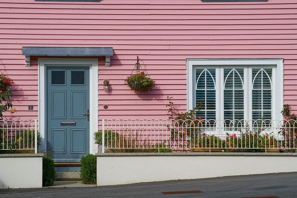 Clapboard adds variety on less formal streets.