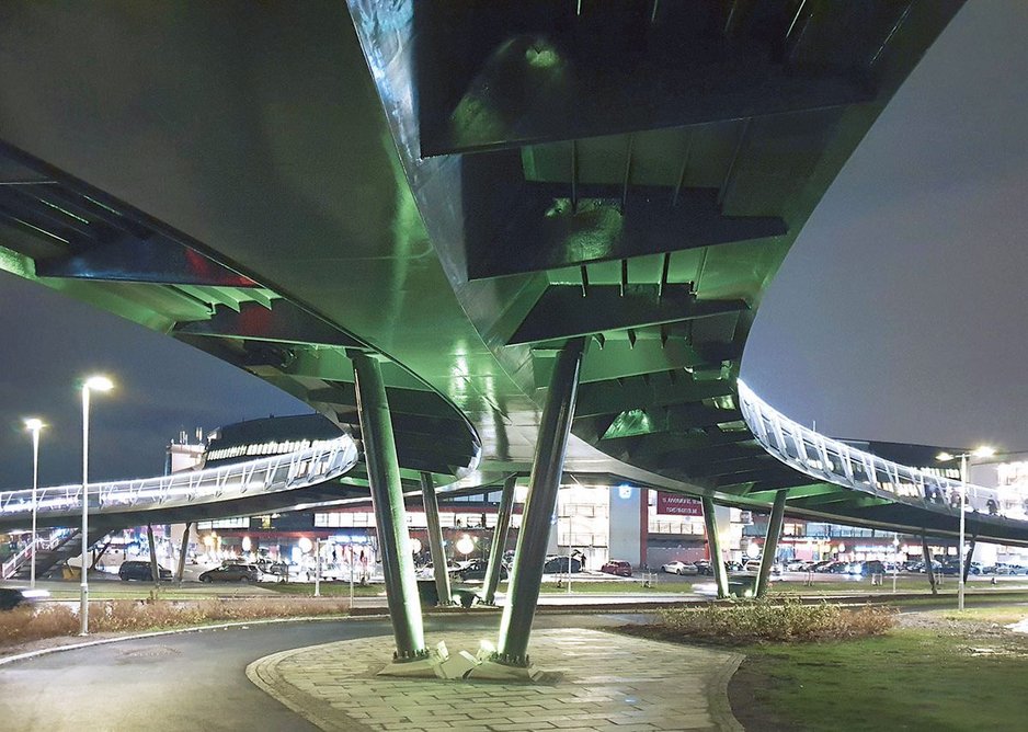 Oslo’s Ullevål Stadium bridge, opened last December, rationalises the movement of bikes and pedestrians while negotiating complex subterranean services.