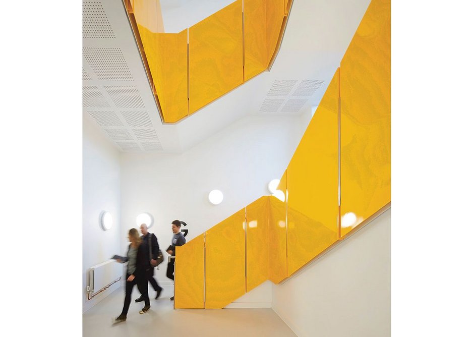 Jazzily colour-coded stairwells help orientate users within the building.