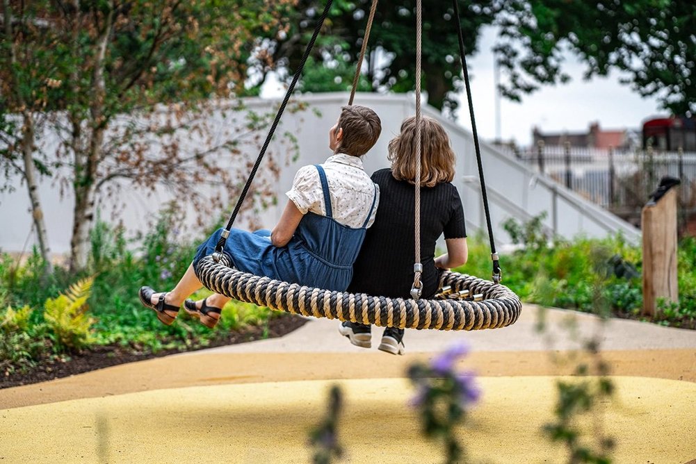 Playequip's cantilever swing in the upper playground.