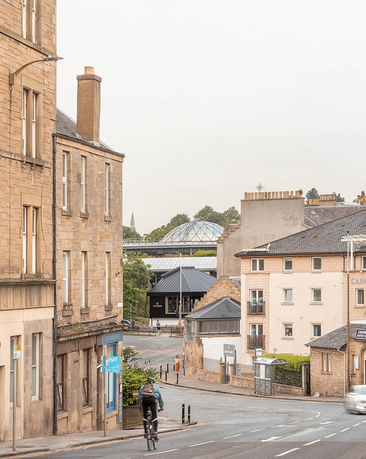 View coming down the street from the city centre, Michael Laird Architects' glass dome at Tanfield behind the new restaurant building.