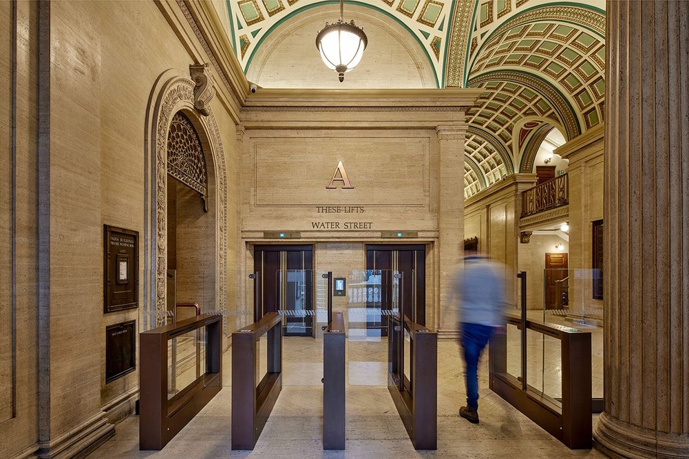 New lifts help the building manage its busy worker and visitor traffic.