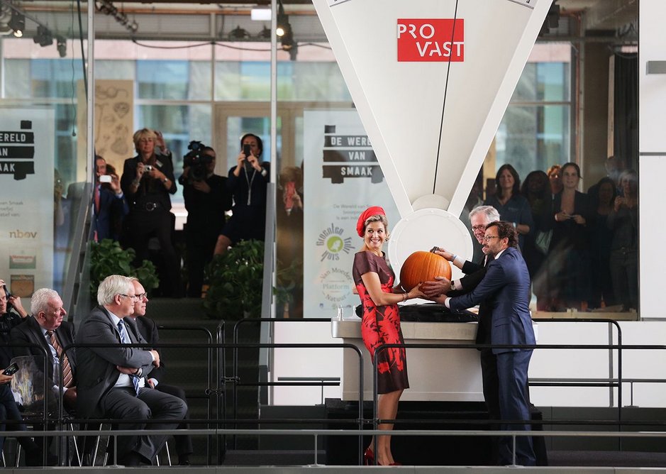 That's Queen Maxima of the Netherlands, receiving a big pumpkin from the developers. Which is nice.