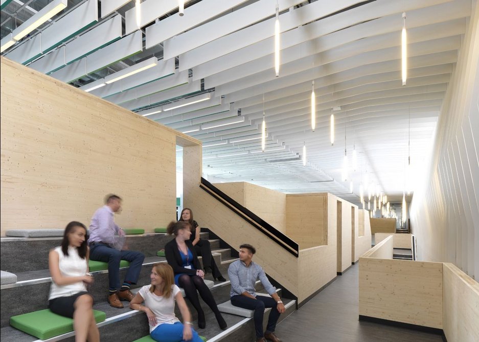 Hidden within the spine is an informal amphitheatre space for larger company meetings.