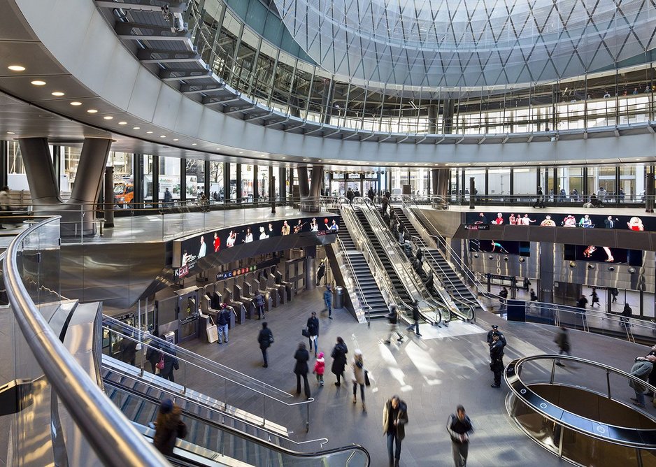 The Fulton Center descends two levels below the street: a mini-oculus brings daylight to the platforms below.