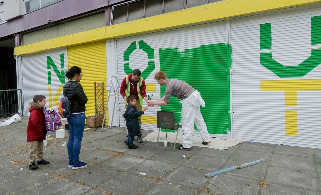 Shabby shutters were rejuvenated in an architect-led community painting day.