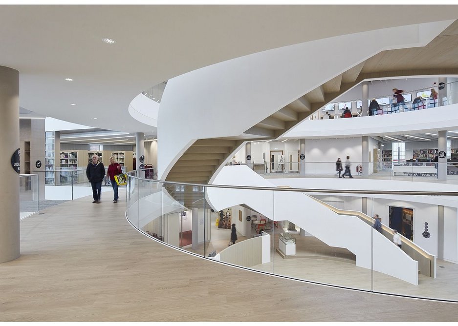 Books are not fetishesed here, the conventional library shelving being pushed to the quieter perimeter of the drum.