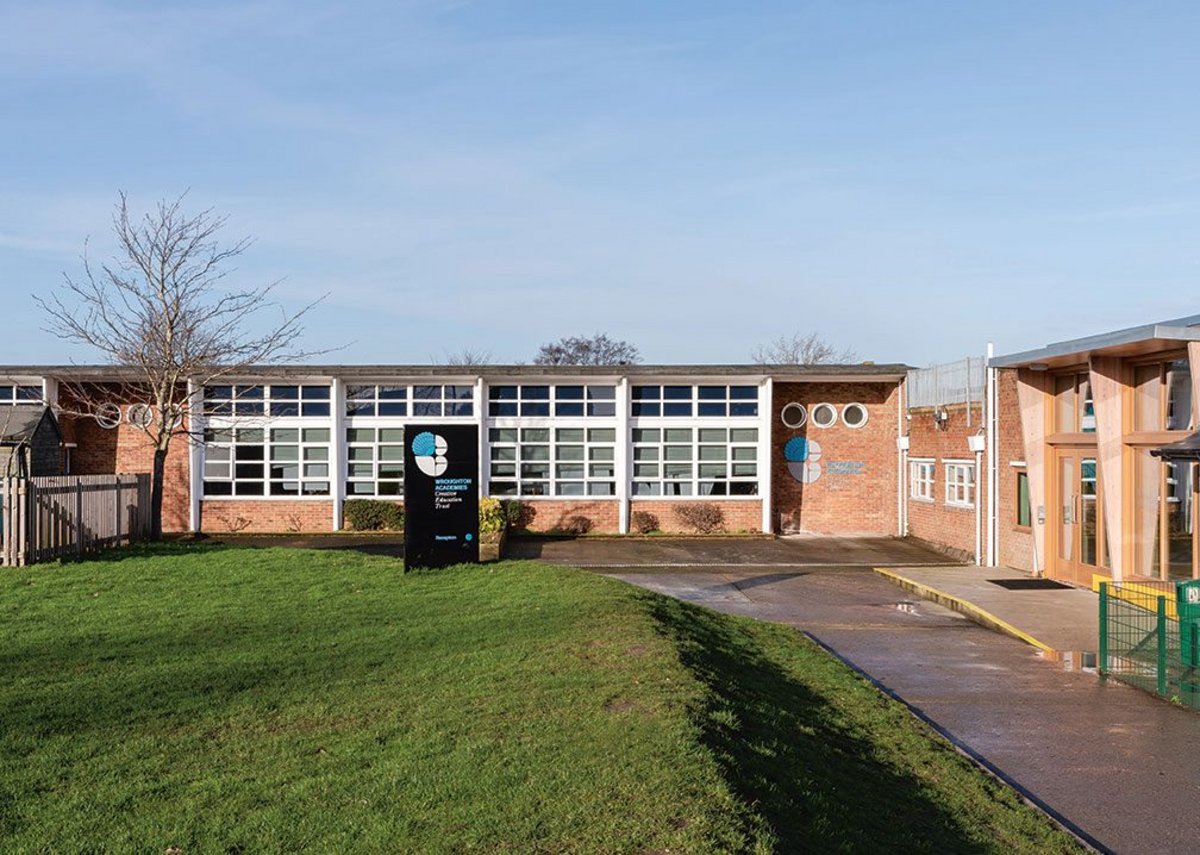 Dk:cm Makes Two Schools One With A Clt And Glass Pavilion 