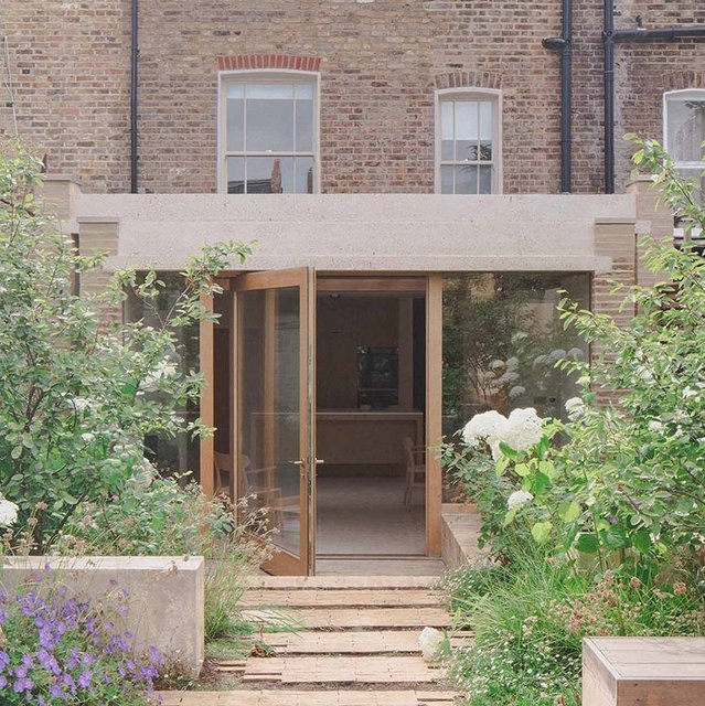 Architecture for London’s extension creates a sense of rhythm through its use of brick