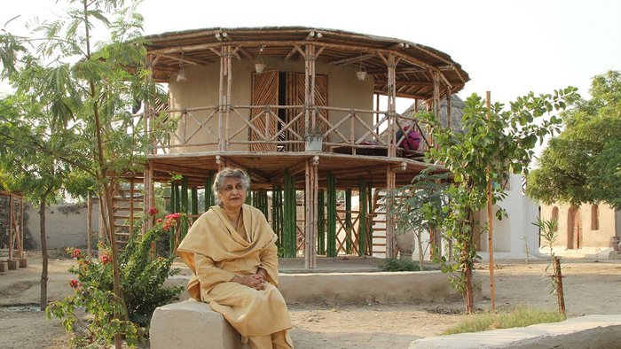 Yasmeen Lari outside a women's centre, built on stilts to survive floods in Sindh.