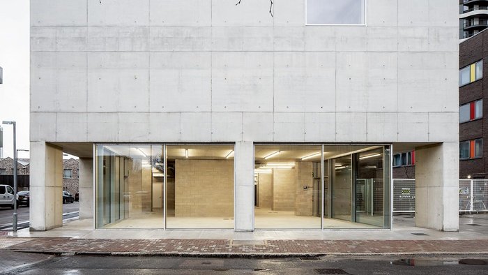 Concrete formwork was composed to suggest masonry construction.