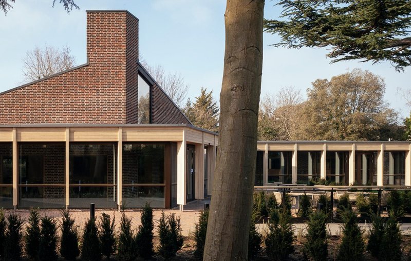 Stirling Prize winner 2023: Mæ’s John Morden Centre. A colonnade acts as a spine for the pavilions, set around a historic Cyprus tree.