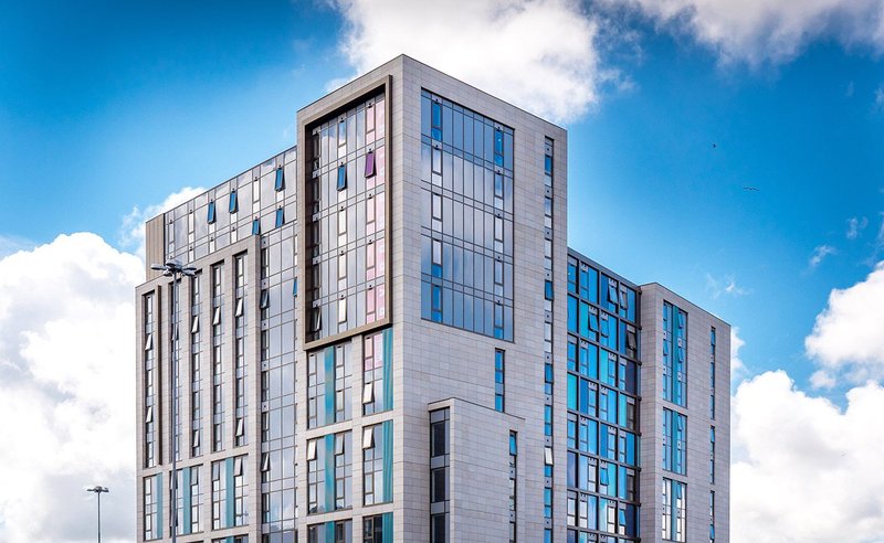 Byrom Point student accommodation in Liverpool. Taylor Maxwell supplied the Generix stone rainscreen system, which comprises 20 to 30mm natural stone cladding panels with a 90-degree horizontal kerf.