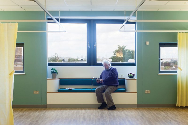 A seating bay in one of the wards at Croydon University Hospital, whose wood-effect vinyl flooring was not only matt and non-slip, but contrasted well with wall surfaces to help those with sight problems or dementia.