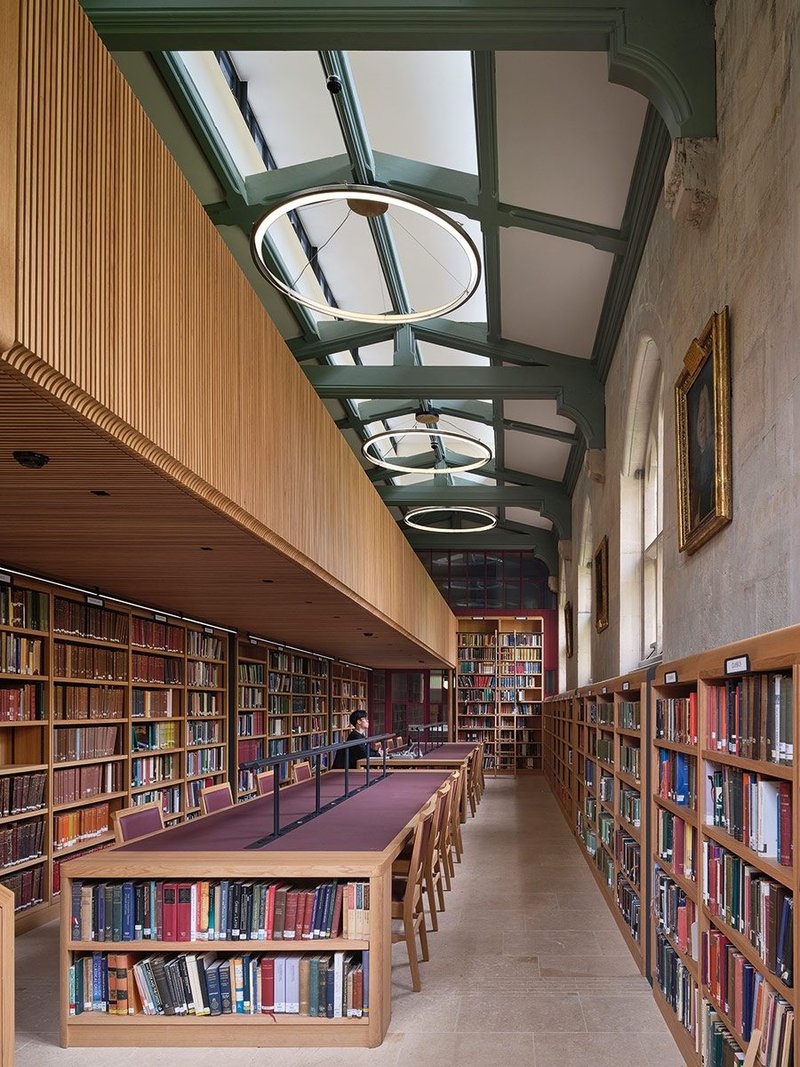 The annex block looking south, with Scott’s original ceiling revealed and hidey-hole spaces hidden behind bespoke bookcases on the left.