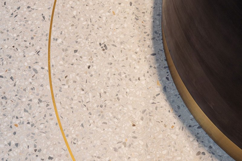 Lazenby's Terrazzo in Off White with marble tones and brass inlay at The Bailey office development, London. Orms architects.