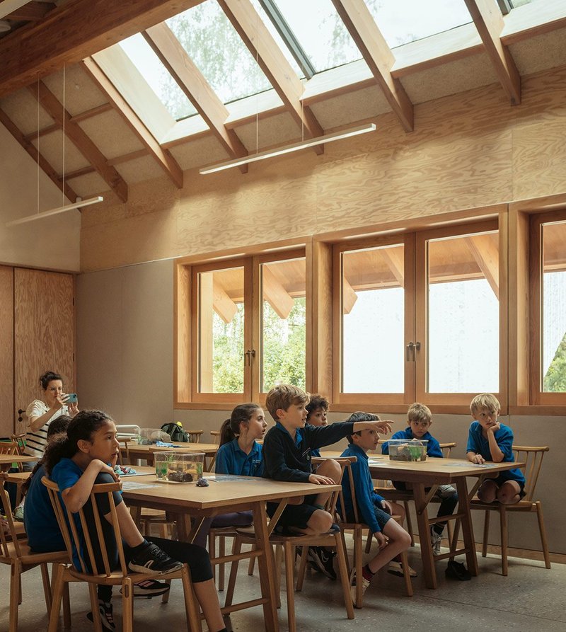 Inside the centre, north-facing rooflights and ply lining make for a pleasant teaching space.
